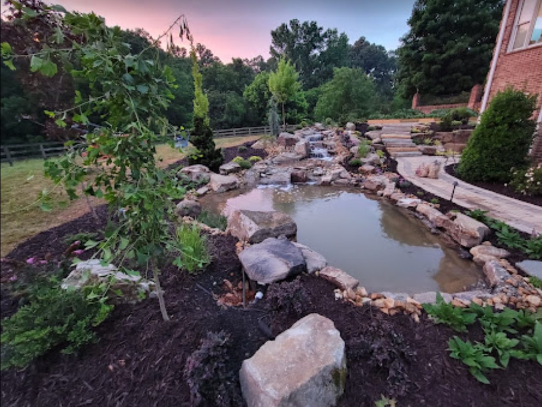 McCoy koi waterfall and pond at sunset
